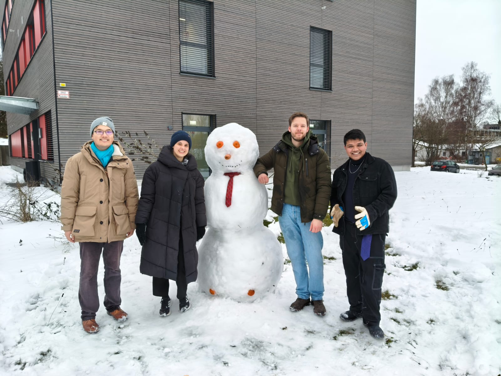 Snowman with people.